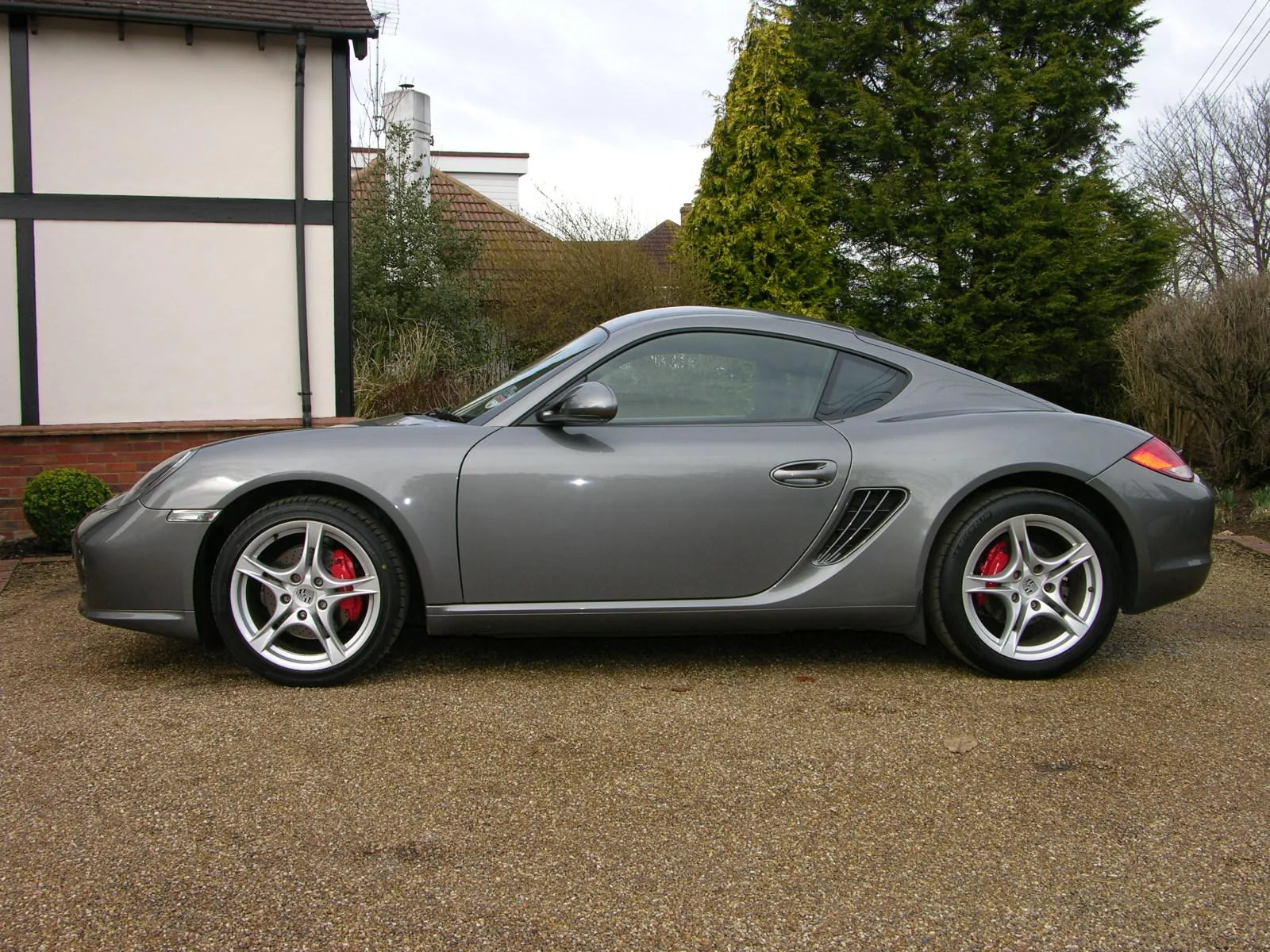 Porsche Cayman S 987 2009 года, вид сбоку